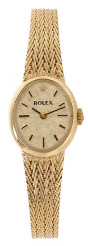 The image shows a front view of the Rolex Cocktail 8415 Women's Yellow Gold Champagne Dial 8415 Women's Yellow Gold Champagne Dial model, highlighting its watch face and intricate gold band.