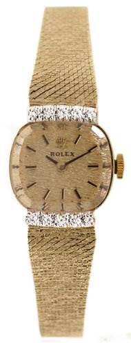 This image shows a frontal view of the Rolex Cocktail 8370 Women's Yellow Gold Champagne Dial 8370 Women's Yellow Gold Champagne Dial model watch, highlighting its dial, bezel, and bracelet.