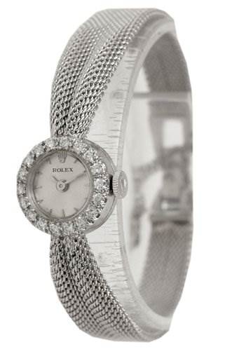 The image shows the Rolex Cocktail Women's White Gold Silver Dial Women's White Gold Silver Dial model watch at a slight angle, highlighting its intricate mesh band and jeweled bezel.