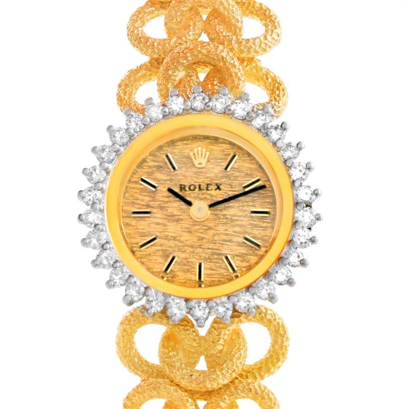 The image shows the dial and partial bracelet from the Rolex Cocktail 8312 Women's Yellow Gold Champagne Dial 8312 Women's Yellow Gold Champagne Dial model, angled from the front.