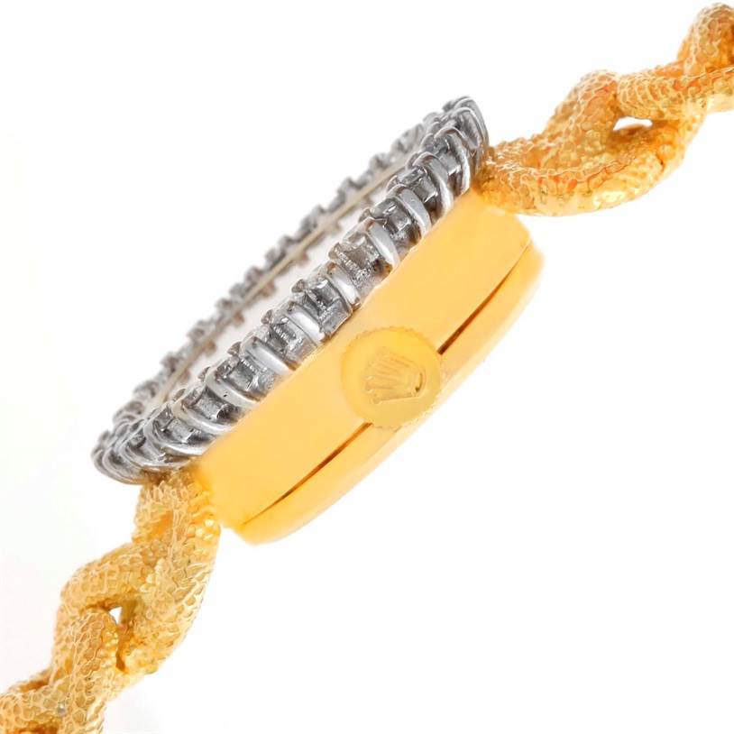 The image shows a side profile of the Rolex Cocktail 8312 Women's Yellow Gold Champagne Dial 8312 Women's Yellow Gold Champagne Dial model watch, highlighting the bezel, crown, and part of the band.