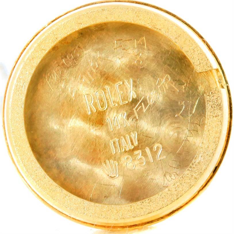 This image shows the inner case back of a Rolex Cocktail 8312 Women's Yellow Gold Champagne Dial 8312 Women's Yellow Gold Champagne Dial model watch, displaying brand markings and specifications.