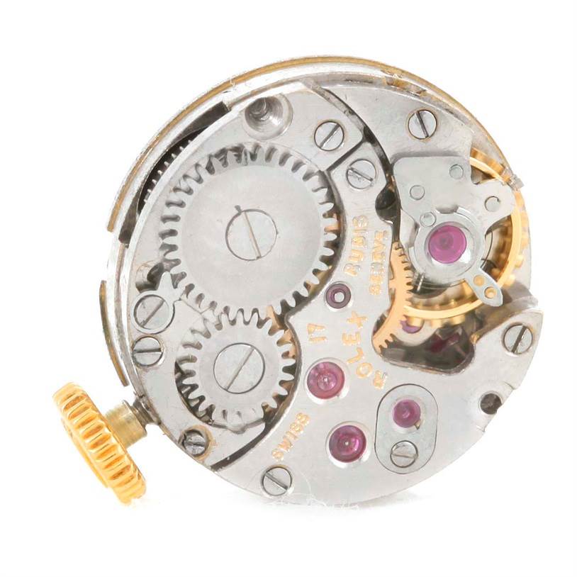 This image shows the internal mechanism, specifically the gears and components, of a Rolex Cocktail 8271 Women's Yellow Gold Silver Dial 8271 Women's Yellow Gold Silver Dial model watch from a top-down angle.