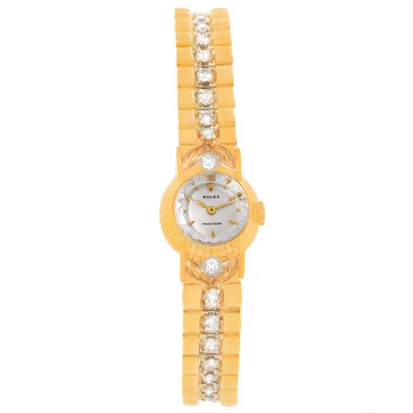 The image shows a front view of a Rolex Cocktail 8271 Women's Yellow Gold Silver Dial 8271 Women's Yellow Gold Silver Dial model watch, highlighting its gold bracelet and diamond accents.