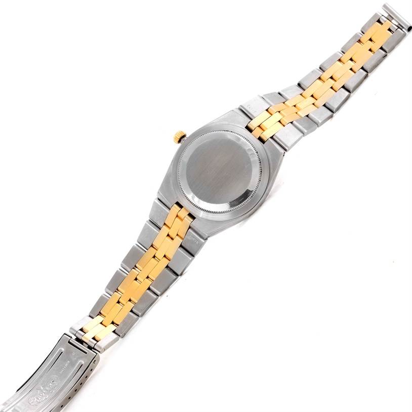 The image shows the back view and the bracelet of the Vintage Collection model by Rolex.