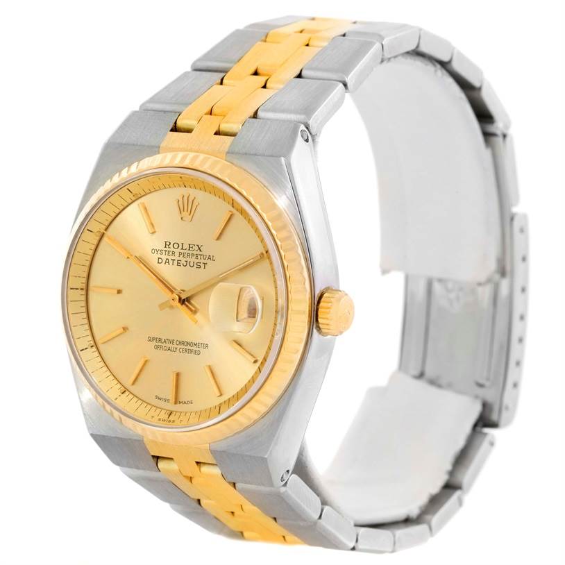 The image shows a side angle view of the Rolex Vintage Collection 1630 Men's Stainless Steel Champagne Dial 1630 Men's Stainless Steel Champagne Dial Datejust watch, highlighting its gold bezel, face, and two-tone metal band.
