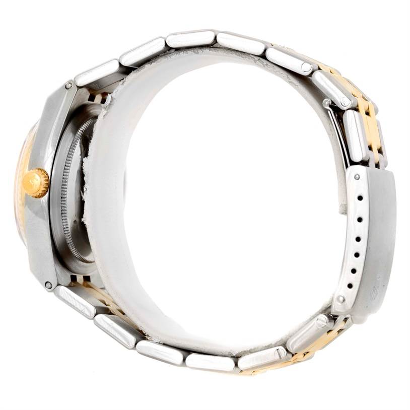 This side view of the Vintage Collection model by Rolex shows the bracelet and crown.