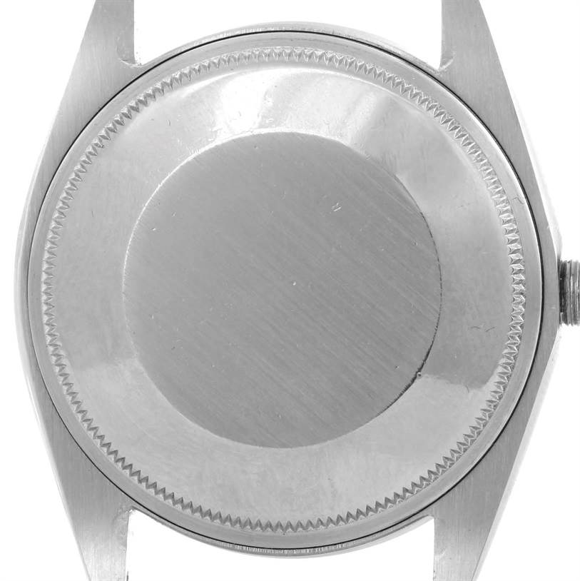 The image shows the back case of a Vintage Collection model watch by Rolex, viewed from the rear.