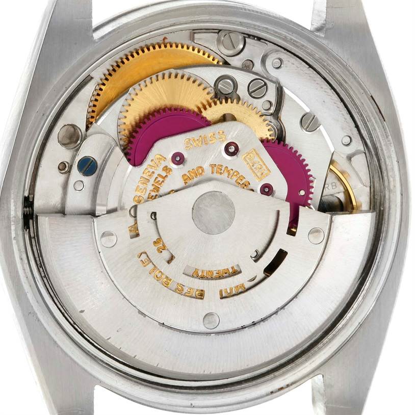 The image shows the internal mechanism of a Rolex Vintage Collection 1500 Men's Stainless Steel Silver Dial 1500 Men's Stainless Steel Silver Dial watch with visible gears and components.