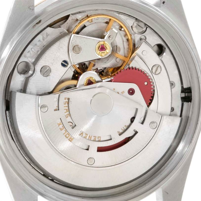 This image shows the intricate internal mechanical movement of a Rolex Vintage Collection 16013 Men's Stainless Steel Champagne Dial 16013 Men's Stainless Steel Champagne Dial model watch from a close-up angle.