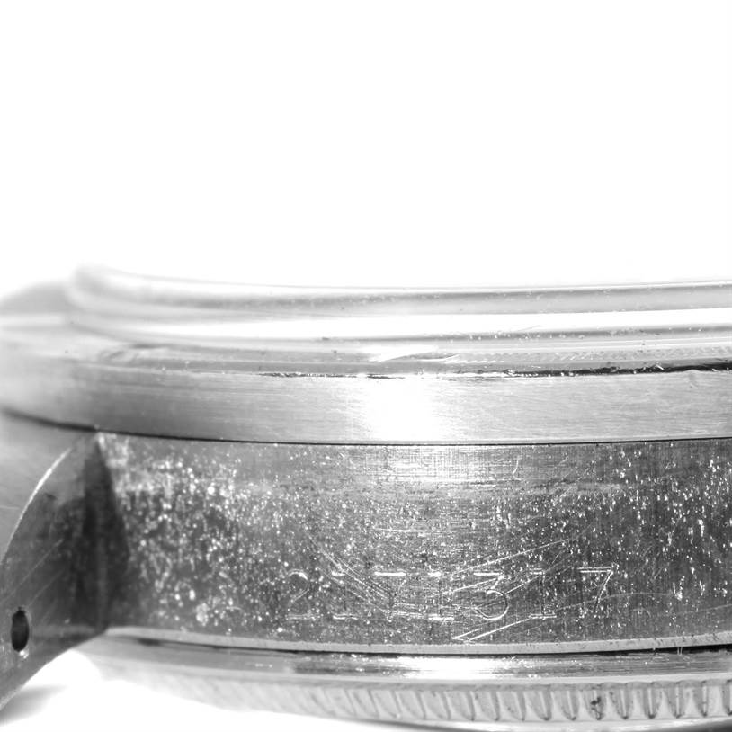 The image shows a close-up side view of the casing and partially the bezel of the Vintage Collection Rolex watch model.