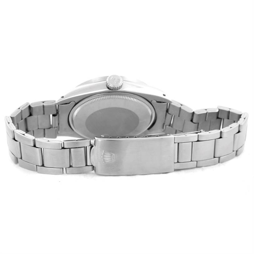 The image shows the back case and steel bracelet clasp of a Rolex Vintage Collection 1501 Men's Stainless Steel Silver Dial 1501 Men's Stainless Steel Silver Dial model watch.