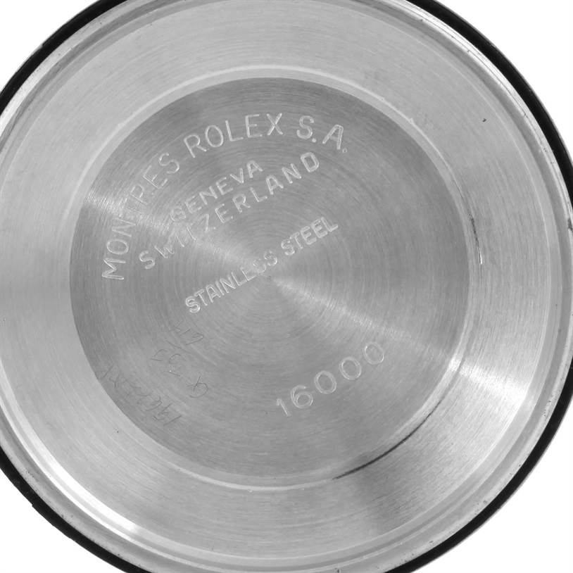 The image shows the inner case back of a Vintage Collection Rolex watch, displaying engravings with model information.