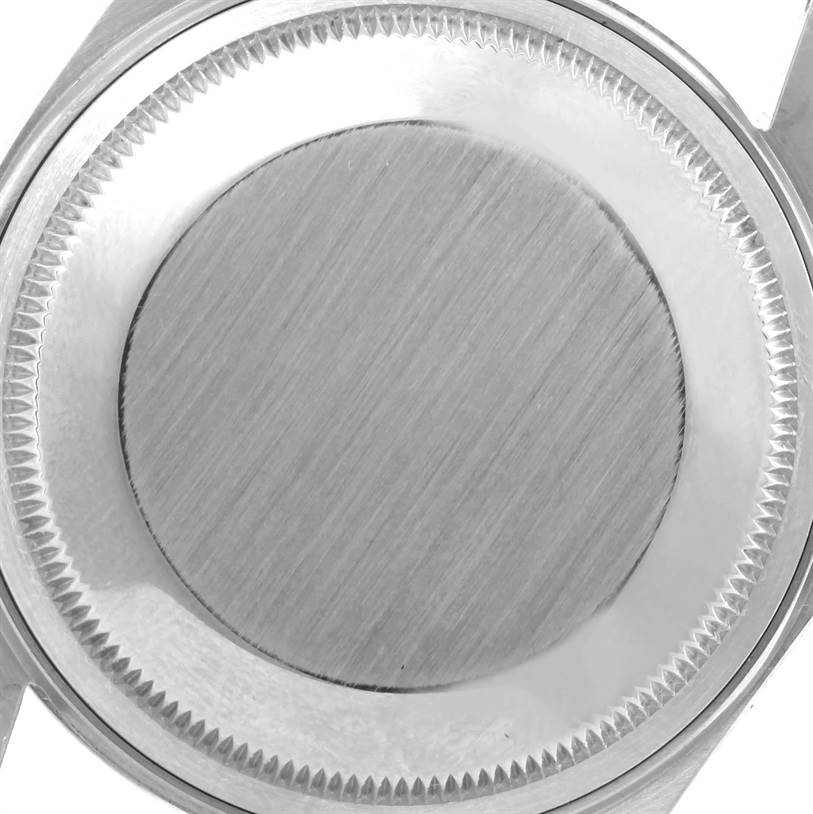 This image shows the stainless steel case back of a Vintage Collection model by Rolex, viewed from the back.