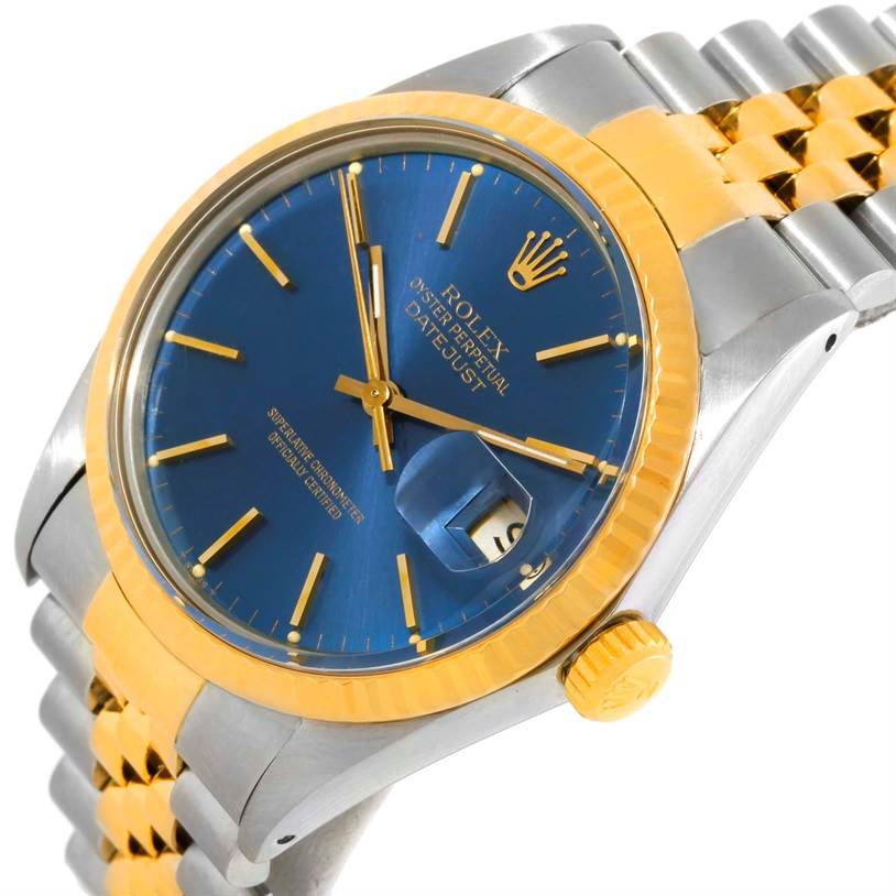 The image shows a Rolex Vintage Collection 16013 Men's Stainless Steel Blue Dial 16013 Men's Stainless Steel Blue Dial Datejust watch at an angle, highlighting its blue dial, gold accents, and bracelet.