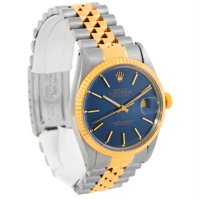 This Rolex Vintage Collection 16013 Men's Stainless Steel Blue Dial 16013 Men's Stainless Steel Blue Dial Datejust watch is shown at an angled side view, highlighting its two-tone bracelet and blue dial.