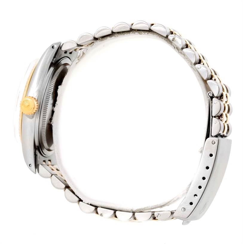 The image shows the side view of the Vintage Collection Rolex watch, highlighting its crown and bracelet.