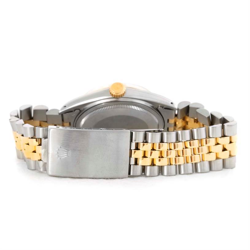 This image shows the back view of the Rolex Vintage Collection 16013 Men's Stainless Steel Champagne Dial 16013 Men's Stainless Steel Champagne Dial watch, highlighting the clasp and bracelet.