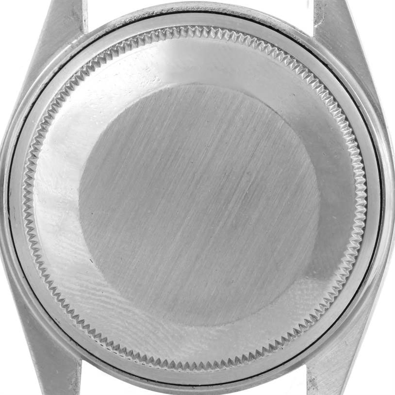 The image shows the back case of the Vintage Collection model by Rolex, viewed from the rear.