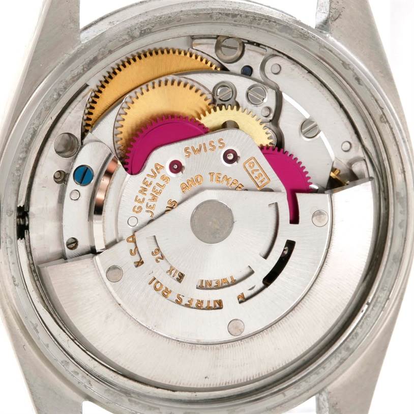 This image shows the internal components and gear mechanism of a Rolex Vintage Collection 1603 Men's Stainless Steel Blue Dial 1603 Men's Stainless Steel Blue Dial watch from a back angle.