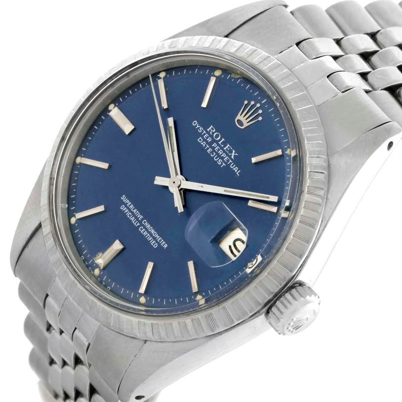The image shows a close-up of the Rolex Vintage Collection 1603 Men's Stainless Steel Blue Dial 1603 Men's Stainless Steel Blue Dial model, featuring its face, crown, and part of the bracelet at a slight angle.