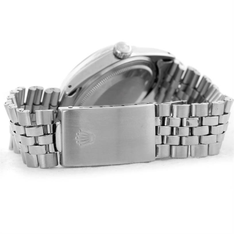 This image shows the backside and clasp of a Vintage Collection Rolex watch, highlighting the bracelet and case back.