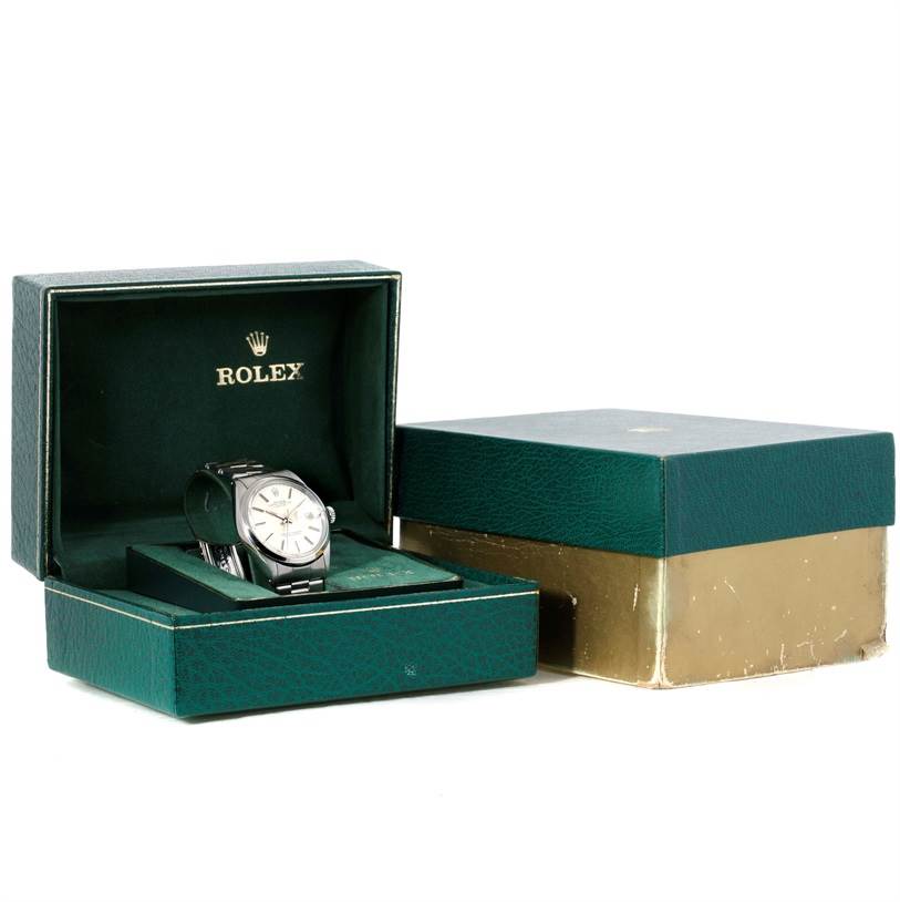 The Rolex Vintage Collection 1500 Men's Stainless Steel Silver Dial 1500 Men's Stainless Steel Silver Dial watch is shown in an open angle, resting in its original box with additional packaging.