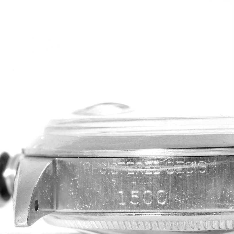 The image shows a side view of the case of a Rolex Vintage Collection 1500 Men's Stainless Steel Silver Dial 1500 Men's Stainless Steel Silver Dial model with "Registered Design 1500".