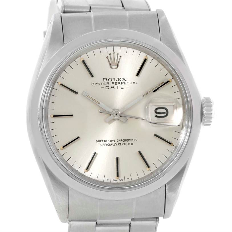 The image shows the face, bezel, and part of the bracelet of the Vintage Collection Rolex Oyster Perpetual Date watch, viewed from the front.