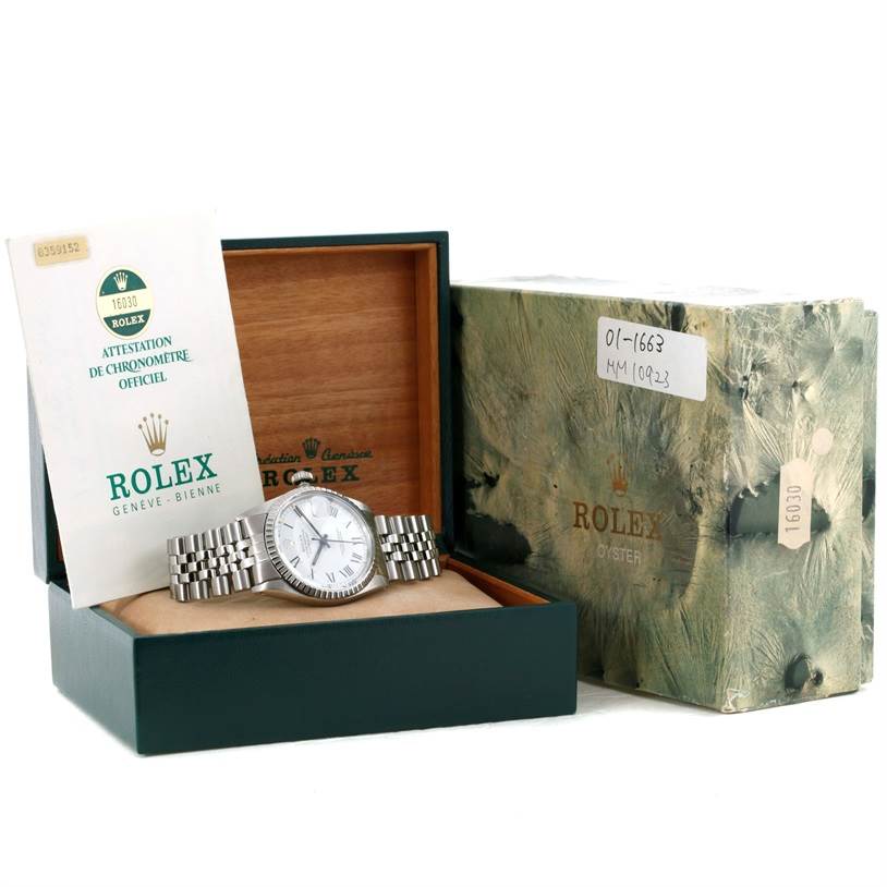 The Rolex Vintage Collection 16030 Men's Stainless Steel White Dial 16030 Men's Stainless Steel White Dial model watch is shown in its box with papers and an outer box at a slightly front-left angle.