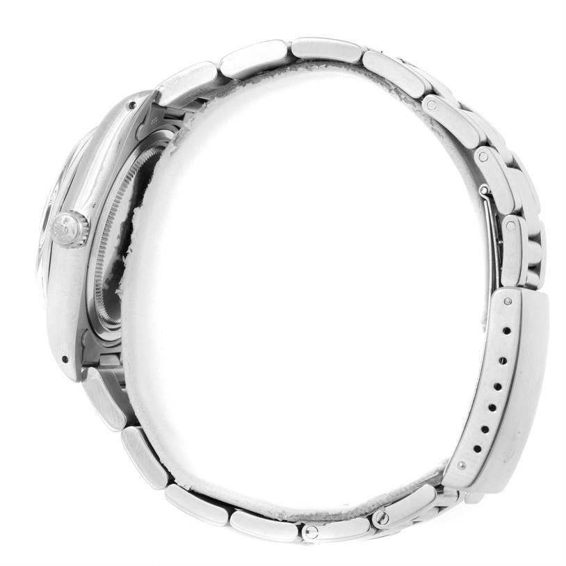 This is a Vintage Collection Rolex watch shown from a side angle, highlighting its case, crown, and bracelet.