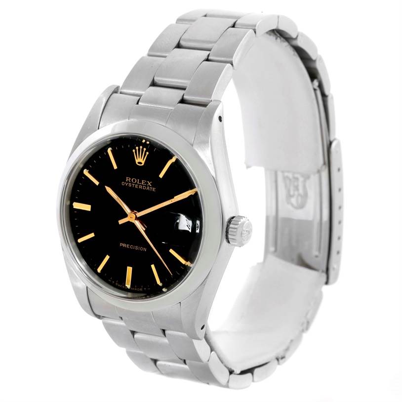 The image shows a side angle of the Rolex Vintage Collection 6694 Men's Stainless Steel Black Dial 6694 Men's Stainless Steel Black Dial watch, displaying its black dial, metal case, and metal bracelet.