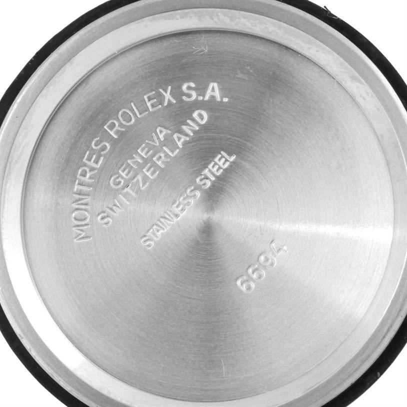 This image shows the inner case back of the Rolex Vintage Collection 6694 Men's Stainless Steel Black Dial 6694 Men's Stainless Steel Black Dial watch model 6694, engraved with brand details.