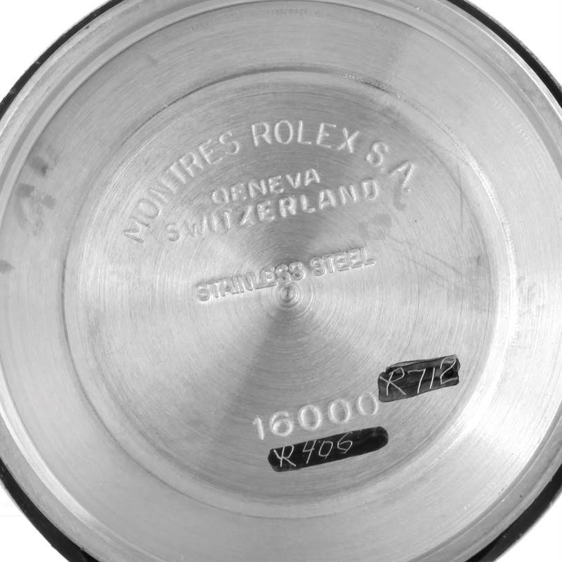 The image shows the inner side of the stainless steel case back of a Vintage Collection watch by Rolex.