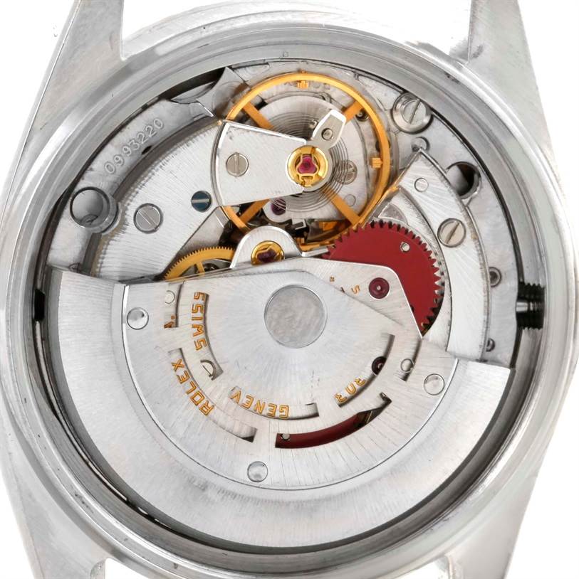 This is a close-up shot of the Rolex Vintage Collection 16030 Men's Stainless Steel Blue Dial 16030 Men's Stainless Steel Blue Dial watch's inner mechanical movement.