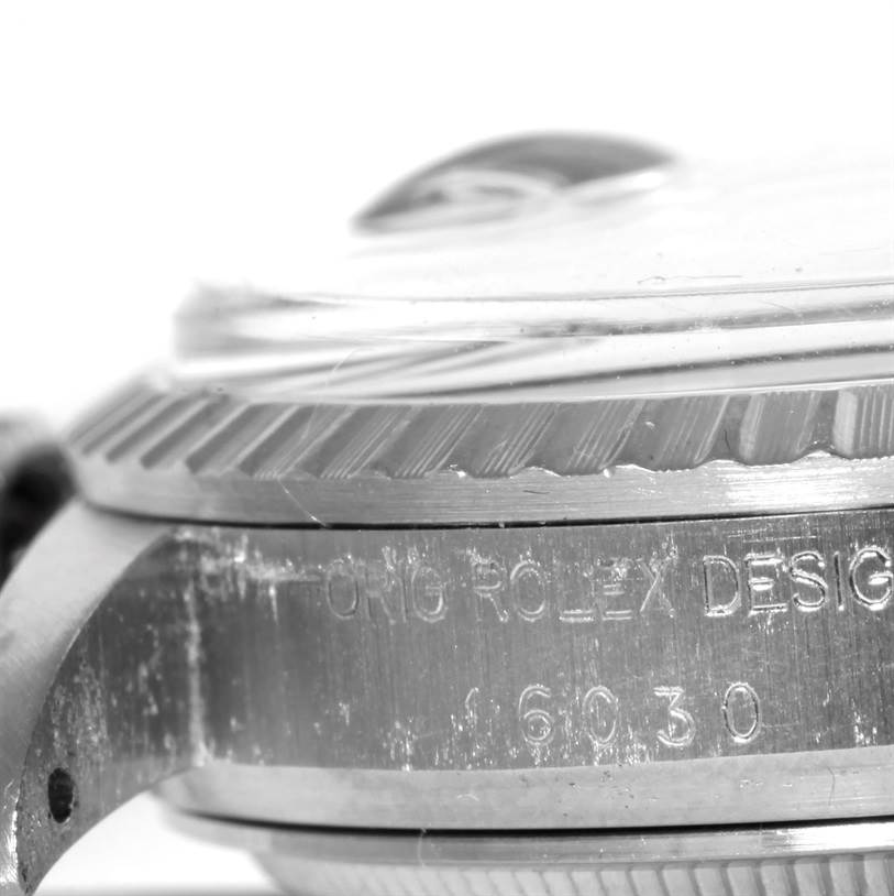 This image shows the side view of the case and bezel of a Vintage Collection Rolex watch model 16030.