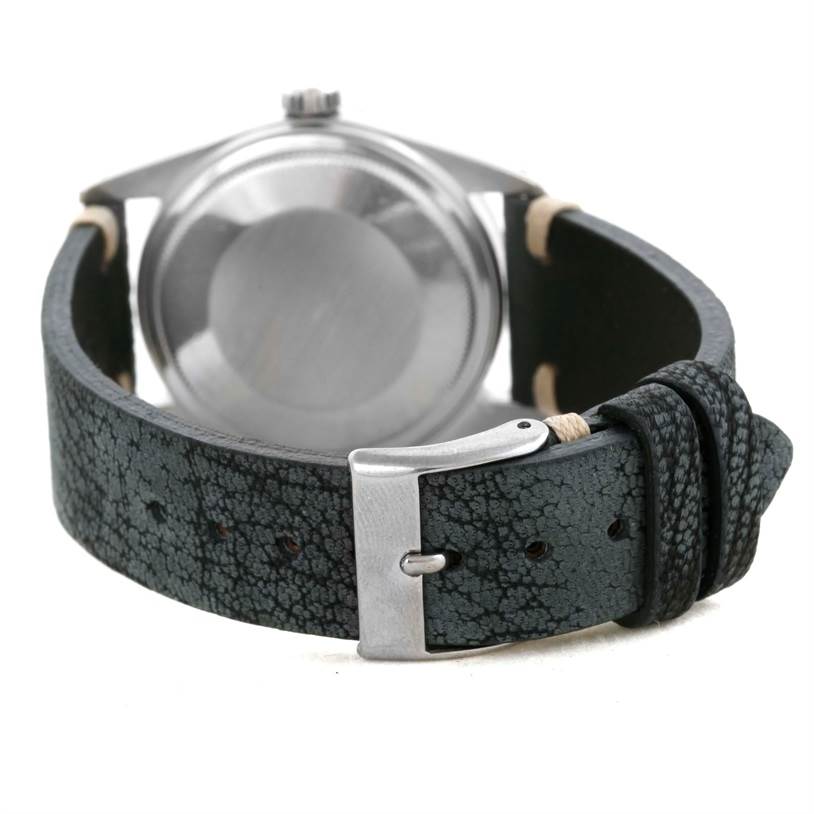 The image shows the back case and leather strap with a buckle of the Rolex Vintage Collection 16030 Men's Stainless Steel Blue Dial 16030 Men's Stainless Steel Blue Dial watch.