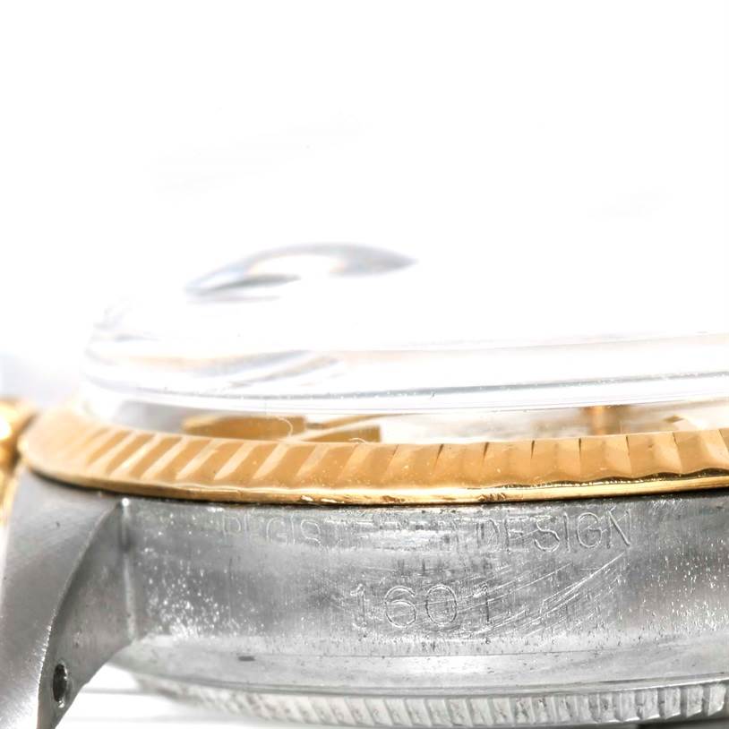 The image shows a close-up side view of the bezel and case of the Rolex Vintage Collection 1601 Men's Stainless Steel Silver Dial 1601 Men's Stainless Steel Silver Dial watch model 1601.