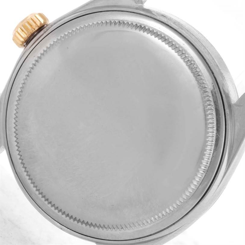 This image shows the back case and crown of the Rolex Vintage Collection 1601 Men's Stainless Steel Silver Dial 1601 Men's Stainless Steel Silver Dial model.