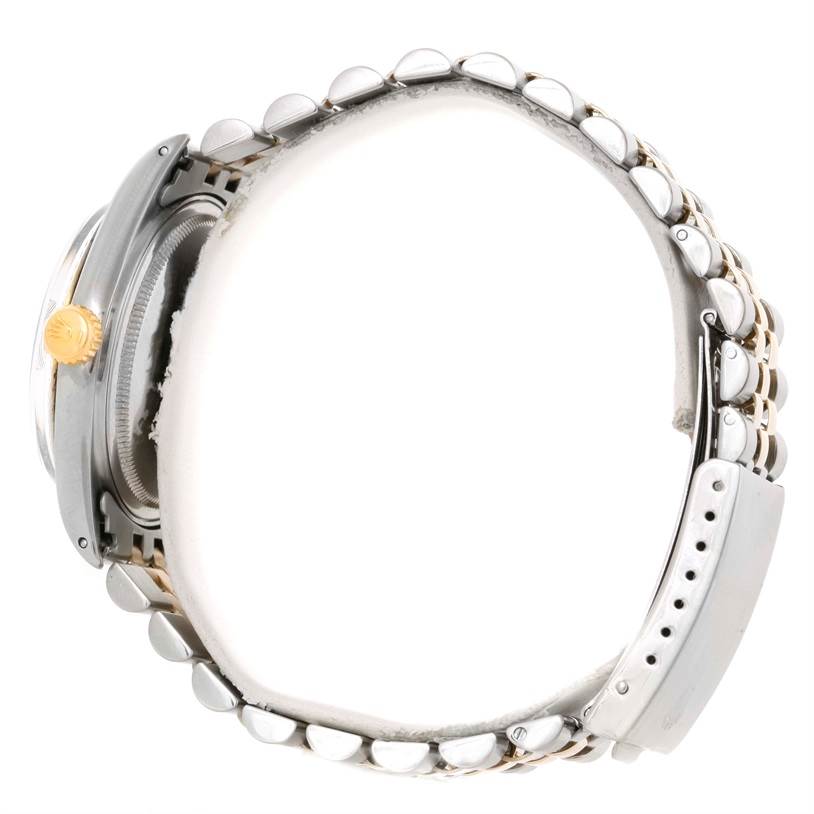 The image shows a side profile of a Vintage Collection Rolex watch, highlighting the case, crown, and metal bracelet.