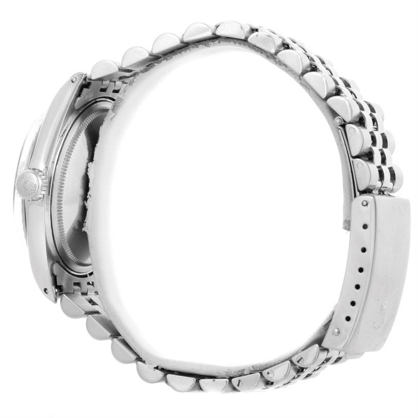 The image shows a Rolex Vintage Collection 1603 Men's Stainless Steel Silver Dial 1603 Men's Stainless Steel Silver Dial watch from a side angle, highlighting the metal bracelet and clasp.