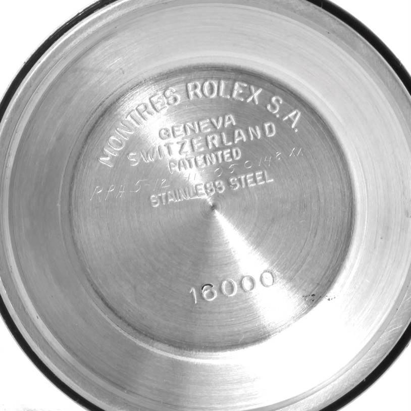 The image shows the back casing of a Vintage Collection Rolex watch, Model 16000, emphasizing its engravings.