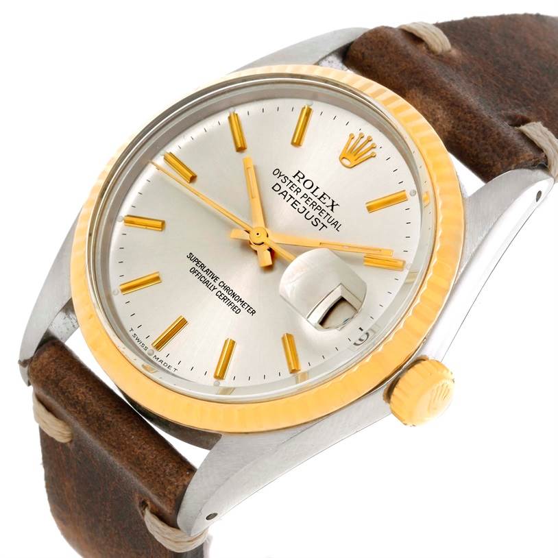 The Rolex Vintage Collection 16013 Men's Stainless Steel Silver Dial 16013 Men's Stainless Steel Silver Dial model watch is shown at an angle displaying the dial, bezel, crown, and leather strap.