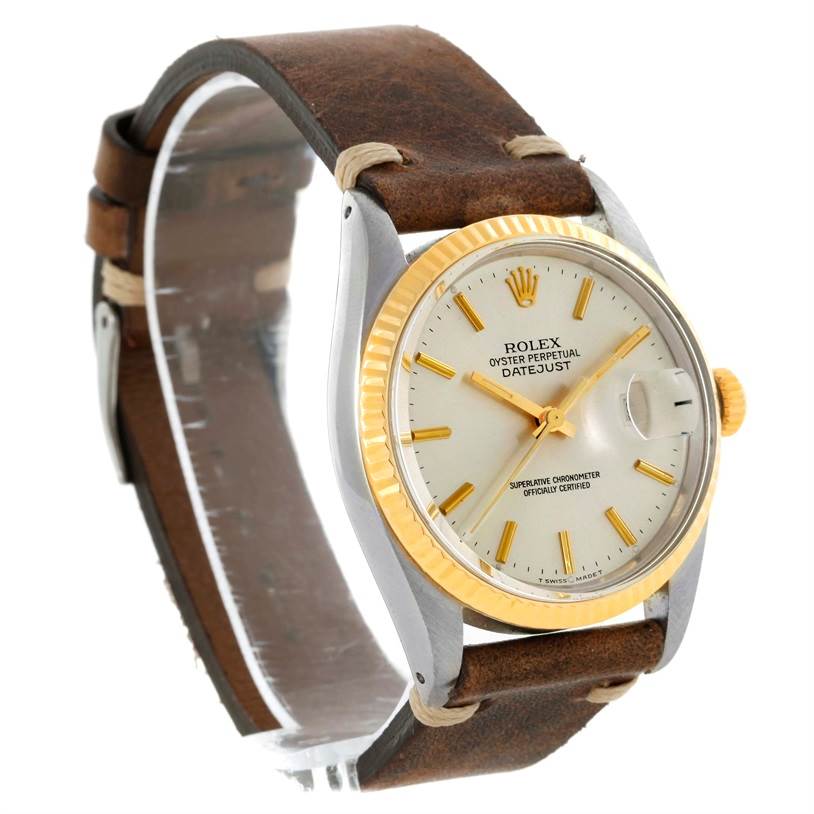 The watch shown is a Rolex Vintage Collection 16013 Men's Stainless Steel Silver Dial 16013 Men's Stainless Steel Silver Dial model, displaying the dial, bezel, crown, and leather strap from an angled side view.