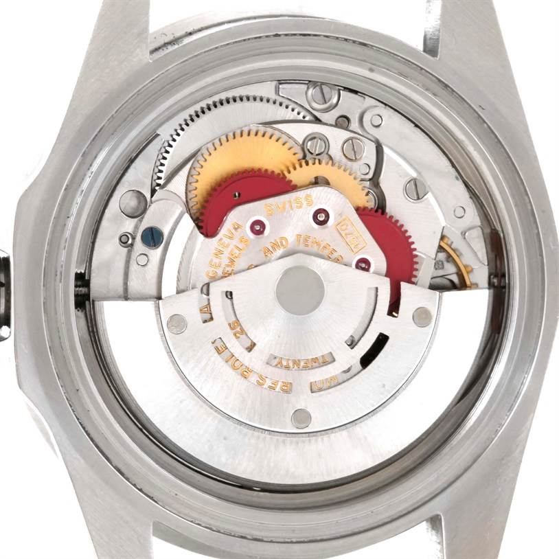 The image shows the internal mechanism and gears of a Rolex Vintage Collection 1665 Men's Stainless Steel Black Dial 1665 Men's Stainless Steel Black Dial watch from a rear view with the back case removed.