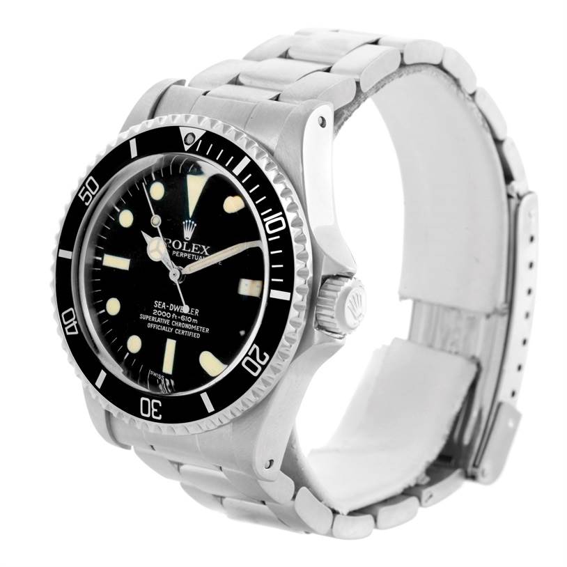 This image shows a side angle of the Rolex Vintage Collection 1665 Men's Stainless Steel Black Dial 1665 Men's Stainless Steel Black Dial Sea-Dweller, highlighting the watch face, bezel, crown, and bracelet.