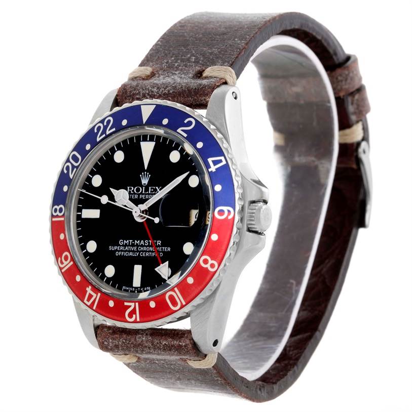 The image shows a side angle of a Rolex Vintage Collection 1675 Men's Stainless Steel Black Dial 1675 Men's Stainless Steel Black Dial GMT-Master watch with a leather strap and red-blue bezel.