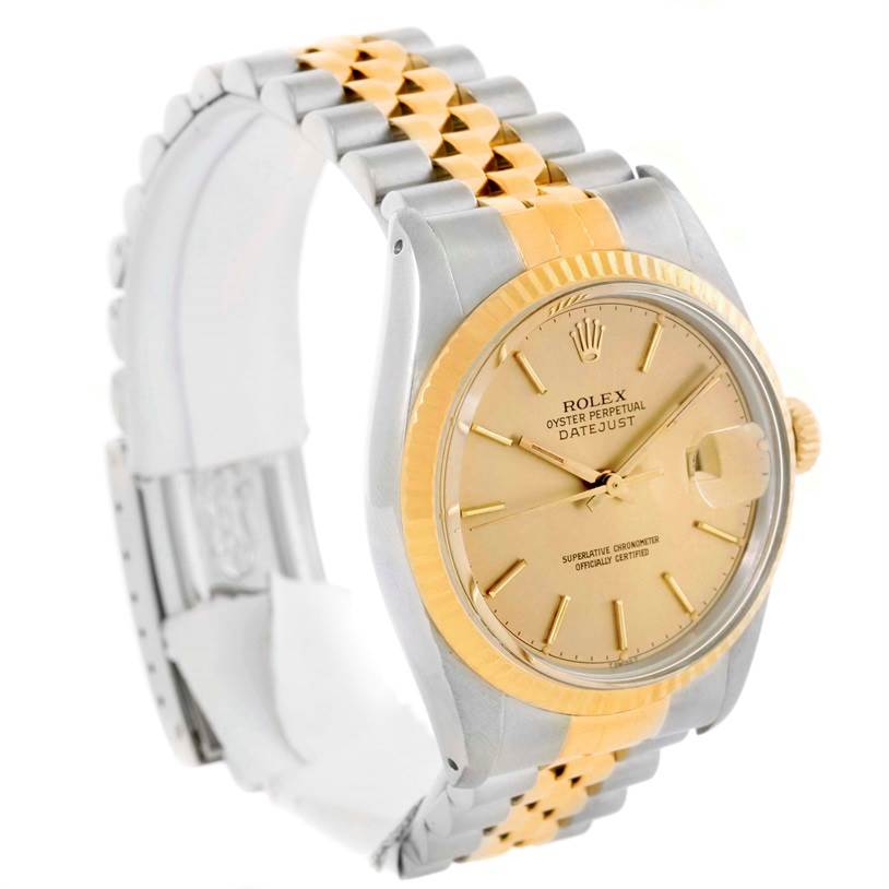 The image shows a side angle of the Rolex Vintage Collection 16013 Men's Stainless Steel Champagne Dial 16013 Men's Stainless Steel Champagne Dial Oyster Perpetual Datejust, highlighting its dial, bezel, and two-tone bracelet.