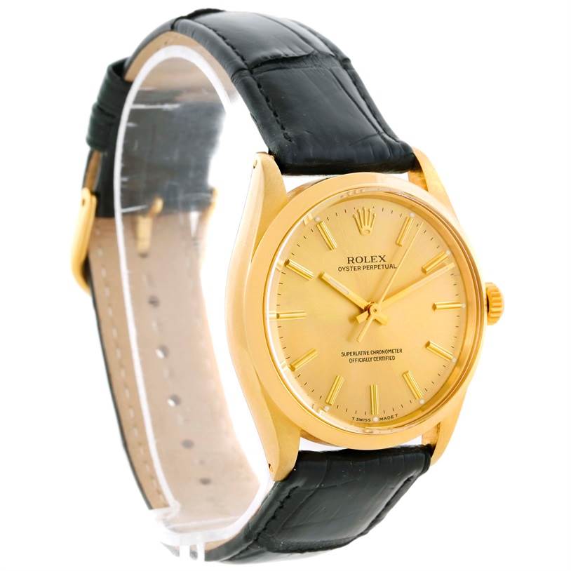 The image shows a side-angle view of a Rolex Vintage Collection 1002 Men's Yellow Gold Champagne Dial 1002 Men's Yellow Gold Champagne Dial watch, highlighting its gold case and black leather strap.