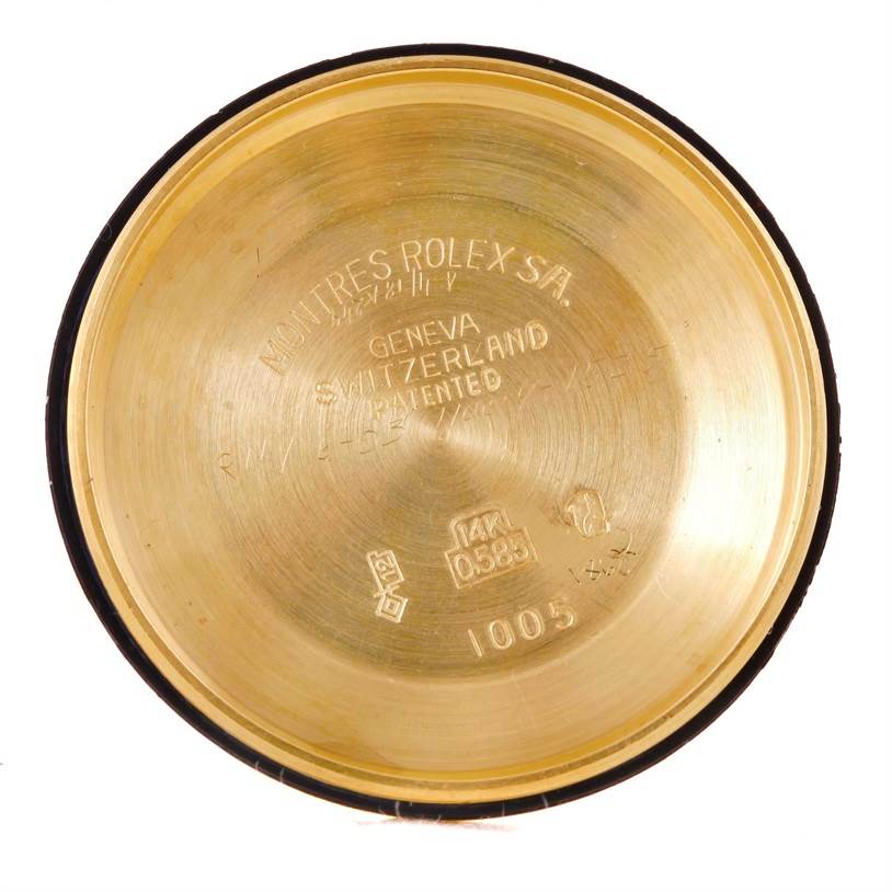 This image shows the inside surface of the case back of a Vintage Collection model by Rolex, featuring engraved specifications.